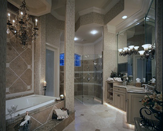 elegant marble master spa bath features a hot tub