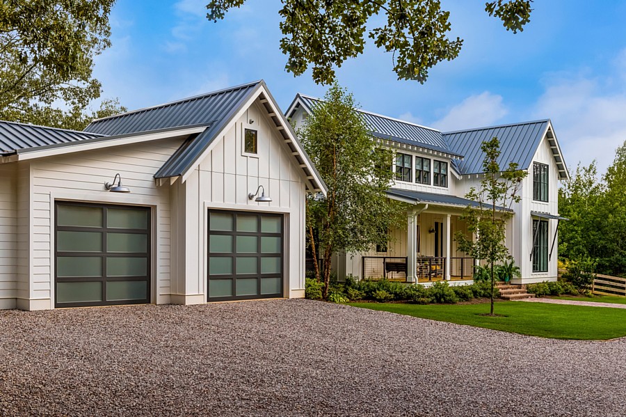 A Modern Farmhouse with Chic Contemporary Glass Garage Doors (Image (C) Andy Frame Photography)