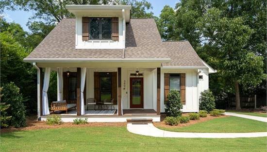 Front view with Covered Porch Reflecting Homeowner Modifications