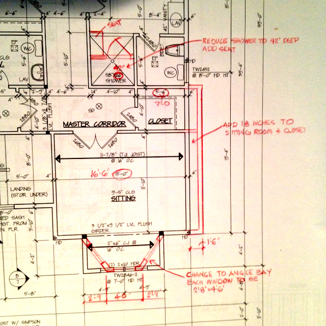 red-lined house blueprint