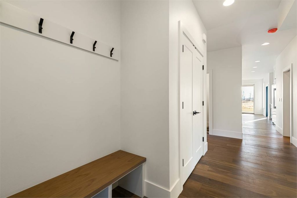 built-ins coming in from the garage of a modegn farmhouse