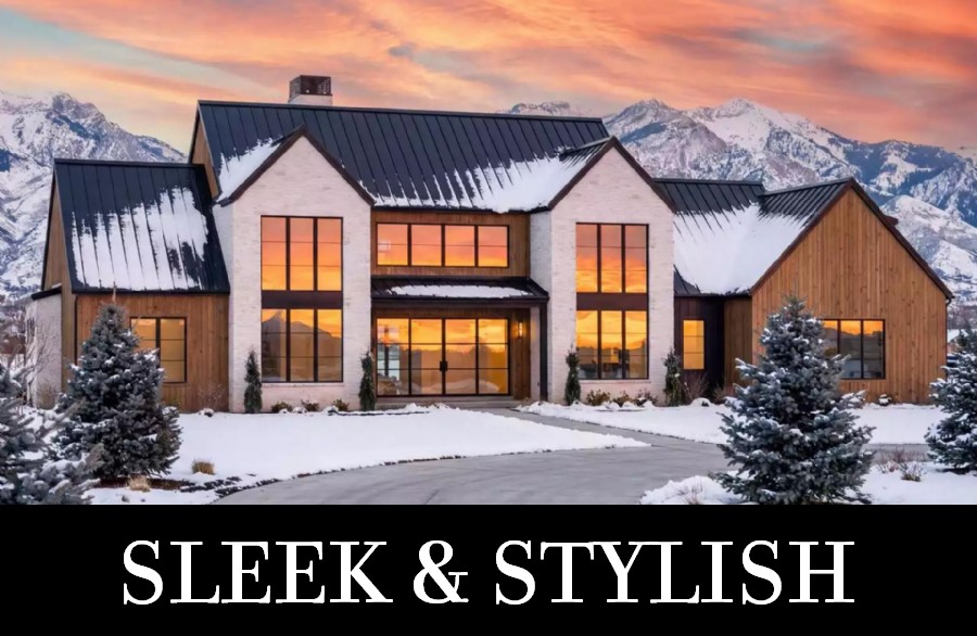 A Grand Luxury Home with Clean Gables, Stone and Wood Siding, and Huge Windows in Front and Back