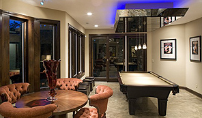 The Basement of This Large, Four-Bedroom Traditional Home Is Perfect for Hosting Men's Night
