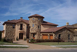 A Large Two-Story Home with Ground-Level Master Suite, Library, and Wet Bar
