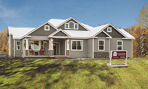 A Three-Bedroom, One-Story Cottage with Den, Open Floor Plan, and Tons of Rear Windows