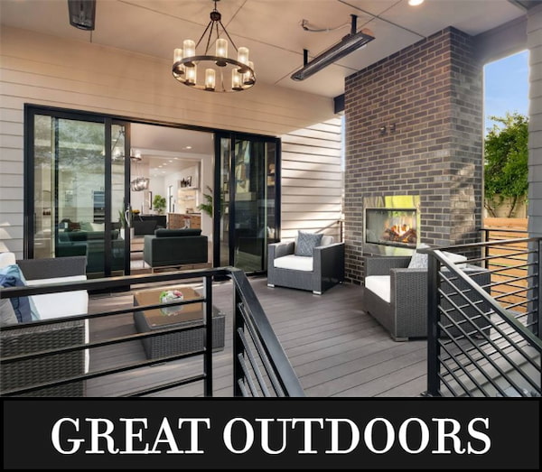 The Covered Deck with Outdoor Fireplace of a Luxury Modern Home for a Wide, Shallow Lot