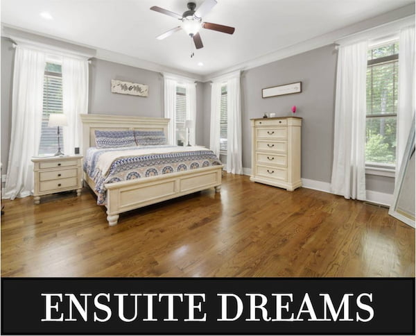 The Master Suite in a Spacious Two-Story Farmhouse with Split Bedrooms and Open Living