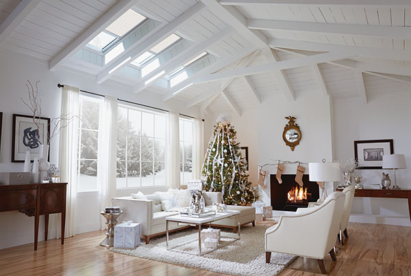 A Cozy Great Room During the Holidays with Brightening Skylights in the Vaulted Ceiling