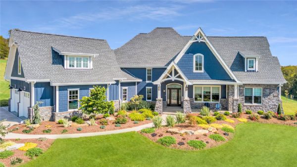 A Beautiful Craftsman Ranch with Blue Siding and a Cool Gray Roof