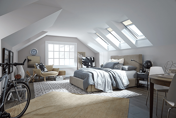 A Loft Bedroom with Skylights over the Bed