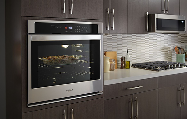 A Single Wall Oven with a Hidden Bake Element That Self Cleans