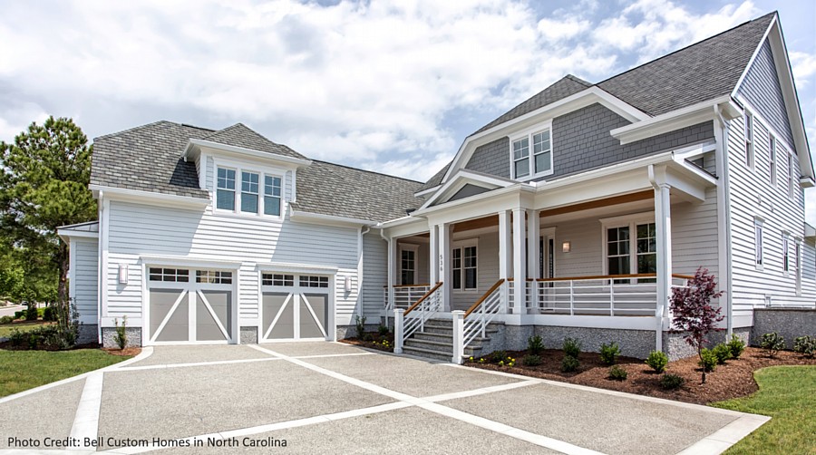 A Beachy Home with Two-Tone Carriage House Garage Doors