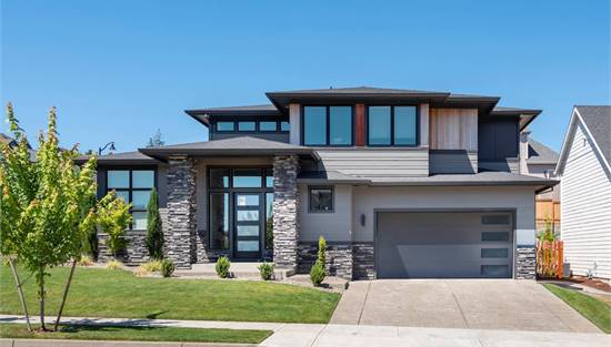 Large Windowed Modern with Wood and Stone Facade