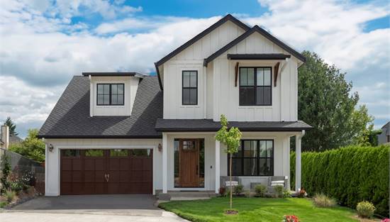 Attractive Family Farmhouse with Board and Batten Facade