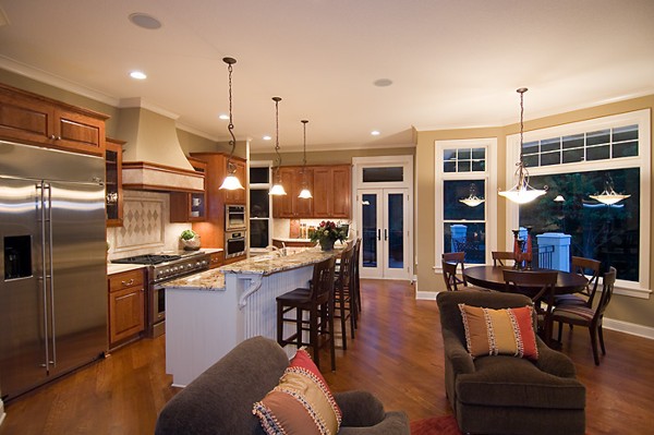 Hardwood flooring enhance the look and feel of the open kitchen.
