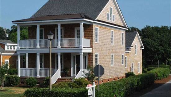 Stunning Front View Featuring Front Porch and Balcony