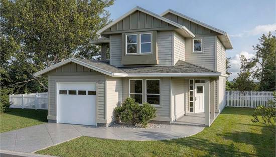 Traditional Farmhouse with Wraparound Covered Entry