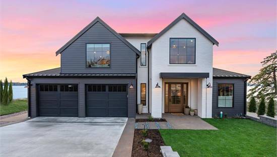 Modern Farmhouse with Stunning Mix of Stone & Siding