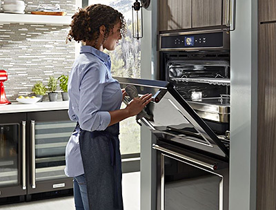 An Oven with Interchangeable Cooking Attachments